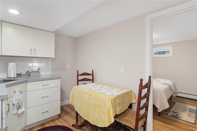 1 Adelaide Ave, Bristol, RI 02809 - dining space featuring light wood-type flooring and recessed lighting