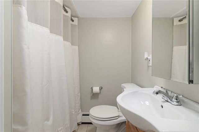1 Adelaide Ave, Bristol, RI 02809 - bathroom with tile patterned flooring, a baseboard heating unit, curtained shower, and vanity