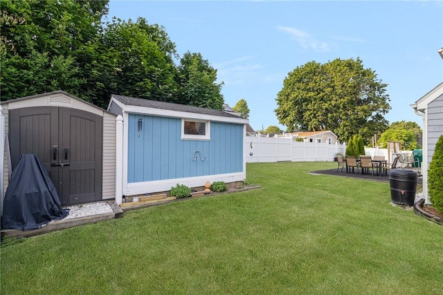 1 Adelaide Ave, Bristol, RI 02809 - view of yard with a storage shed and a patio area