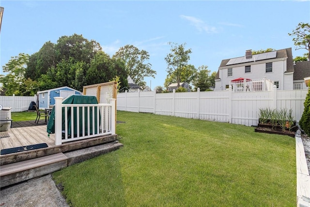 1 Adelaide Ave, Bristol, RI 02809 - fenced backyard featuring a storage unit and a deck