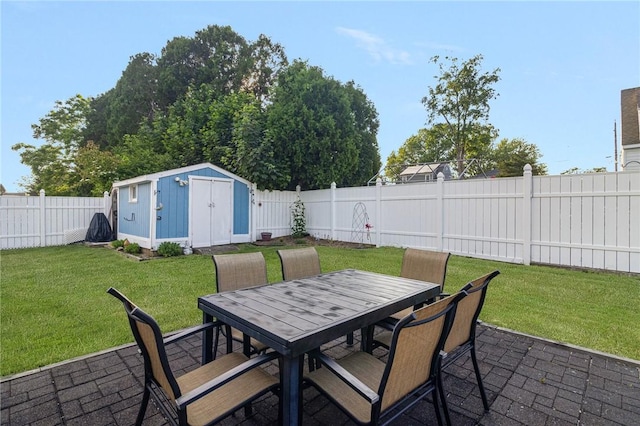 1 Adelaide Ave, Bristol, RI 02809 - fenced backyard featuring a storage unit, a patio area, and outdoor dining area