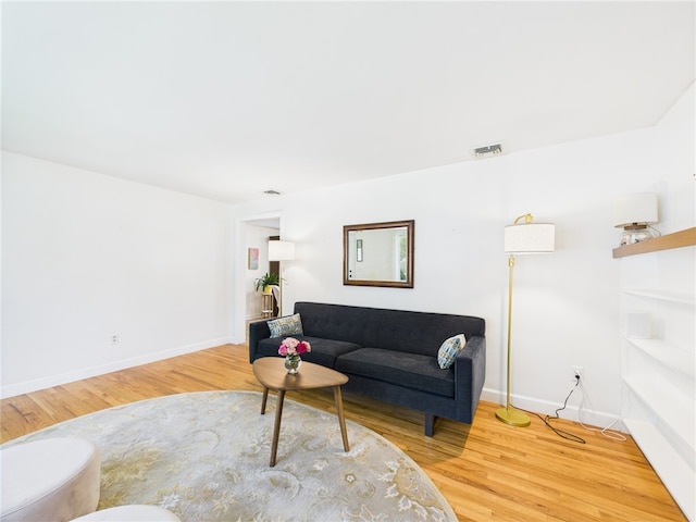 65 Bayberry Ln, East Greenwich, RI 02818 - living area with wood finished floors and baseboards