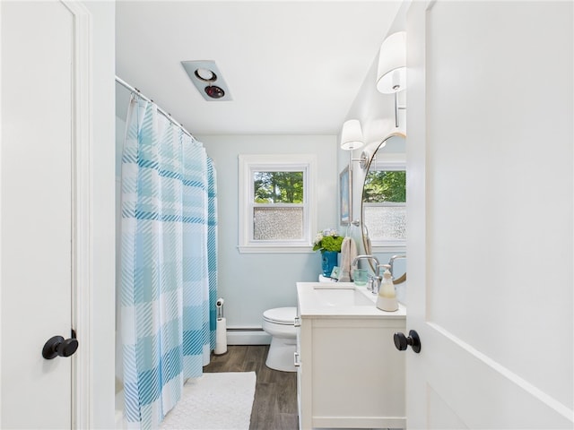 65 Bayberry Ln, East Greenwich, RI 02818 - full bath with vanity, a baseboard heating unit, wood finished floors, and a shower with curtain
