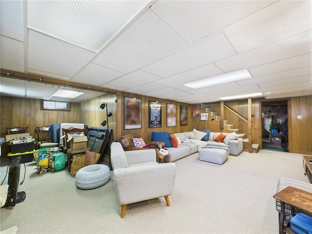 65 Bayberry Ln, East Greenwich, RI 02818 - living area featuring carpet, wooden walls, stairs, and a paneled ceiling