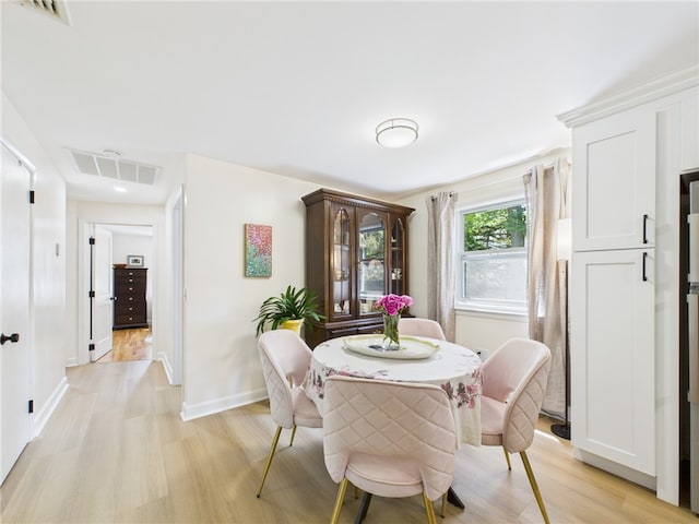 65 Bayberry Ln, East Greenwich, RI 02818 - dining area with light wood finished floors