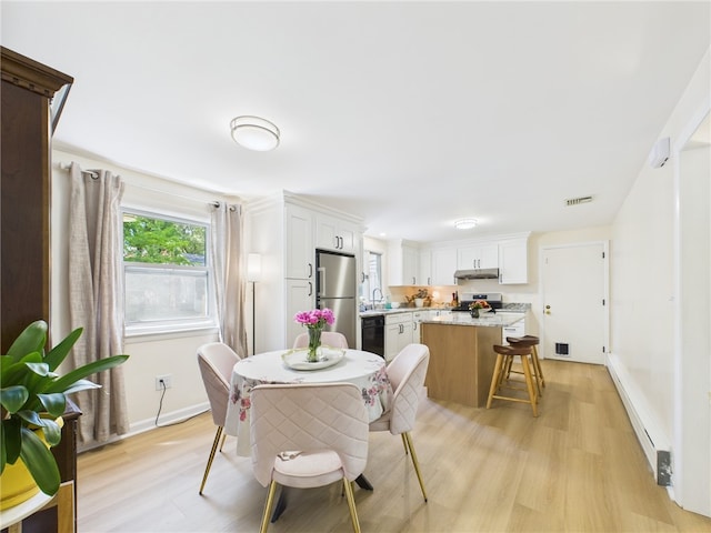 65 Bayberry Ln, East Greenwich, RI 02818 - dining room with light wood finished floors