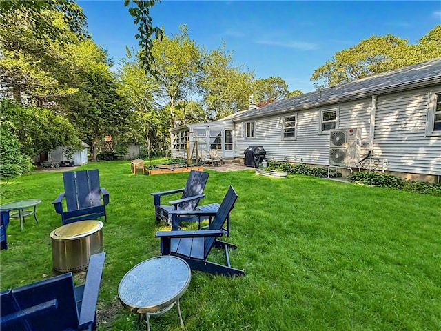 65 Bayberry Ln, East Greenwich, RI 02818 - view of grassy yard with a sunroom
