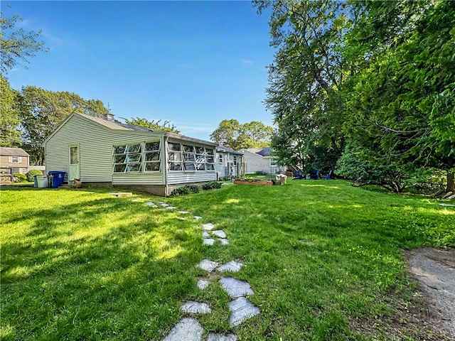 65 Bayberry Ln, East Greenwich, RI 02818 - view of grassy yard featuring a sunroom