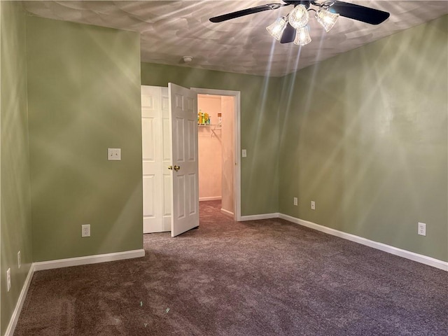 17 Chester Ave, Warwick, RI 02889 - unfurnished bedroom with carpet, a walk in closet, and ceiling fan