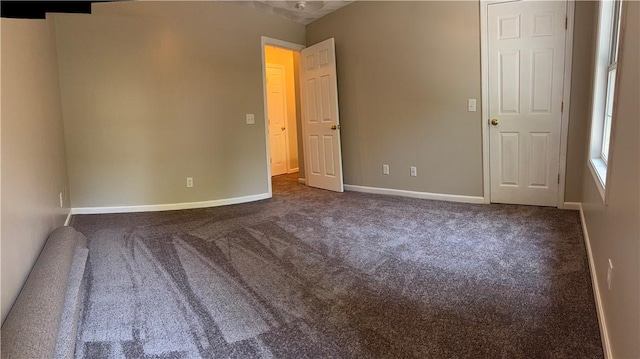 17 Chester Ave, Warwick, RI 02889 - spare room with dark colored carpet