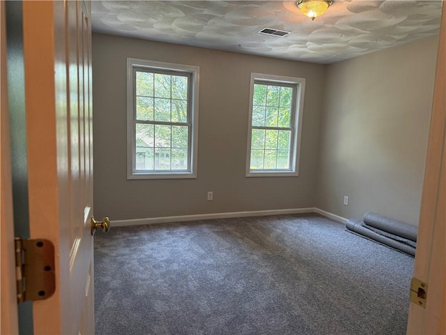 17 Chester Ave, Warwick, RI 02889 - carpeted empty room featuring plenty of natural light