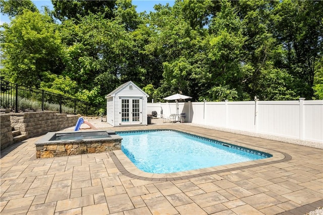 6 Fleuette Dr, Bellingham, MA 02019 - view of swimming pool featuring french doors, a patio, a fenced backyard, and an outdoor structure