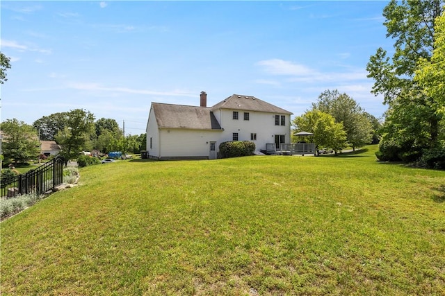 6 Fleuette Dr, Bellingham, MA 02019 - rear view of house featuring a chimney