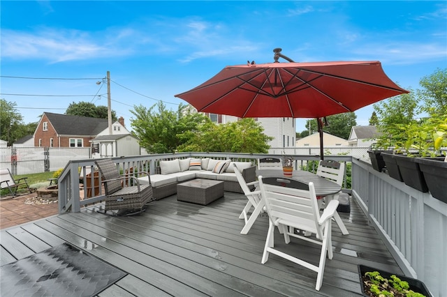 32 Waterman Ave, Johnston, RI 02919 - wooden deck featuring an outdoor hangout area, a shed, and outdoor dining space