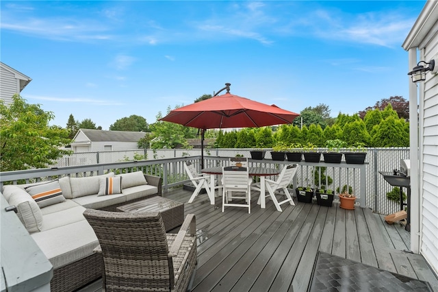 32 Waterman Ave, Johnston, RI 02919 - wooden terrace with an outdoor hangout area and outdoor dining space