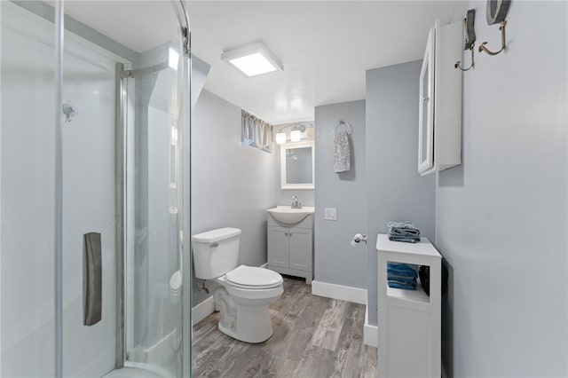 32 Waterman Ave, Johnston, RI 02919 - bathroom with wood finished floors, a shower stall, and vanity