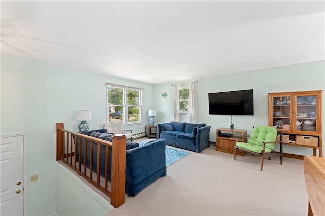 143 Juniper Rd, South Kingstown, RI 02879 - carpeted living area with a baseboard heating unit