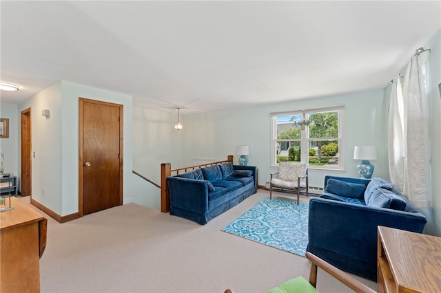 143 Juniper Rd, South Kingstown, RI 02879 - living room with carpet flooring and a baseboard heating unit