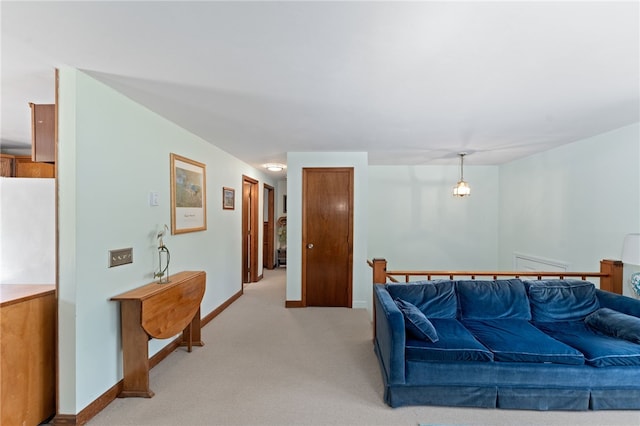 143 Juniper Rd, South Kingstown, RI 02879 - living area featuring light carpet and baseboards