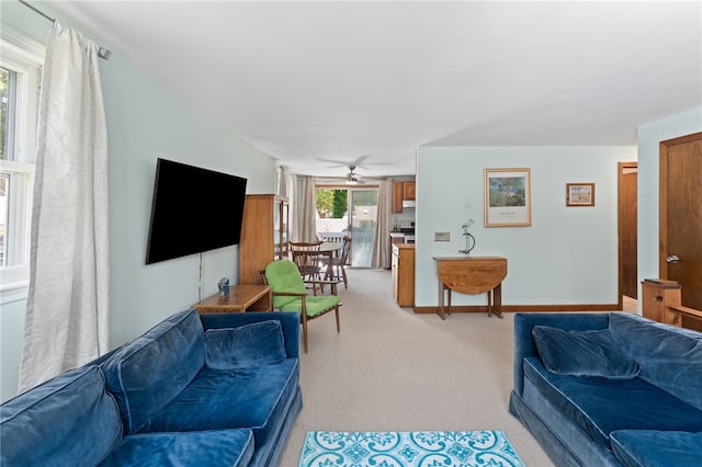 143 Juniper Rd, South Kingstown, RI 02879 - living area featuring light colored carpet and a ceiling fan