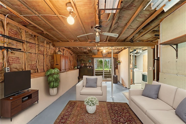 143 Juniper Rd, South Kingstown, RI 02879 - living area featuring concrete floors and washer / clothes dryer