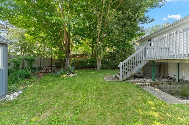 143 Juniper Rd, South Kingstown, RI 02879 - fenced backyard featuring stairs and a deck