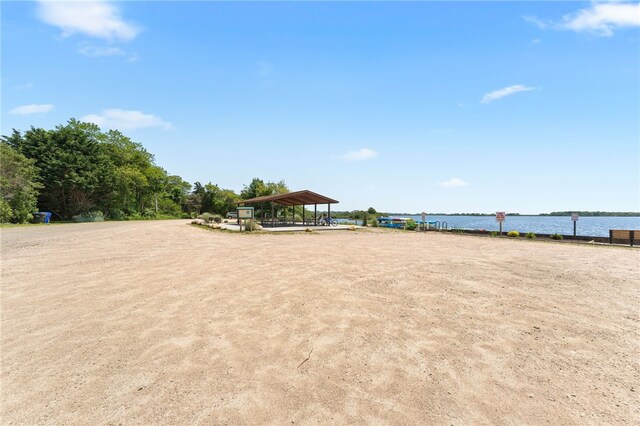 143 Juniper Rd, South Kingstown, RI 02879 - view of yard with a water view and a detached carport