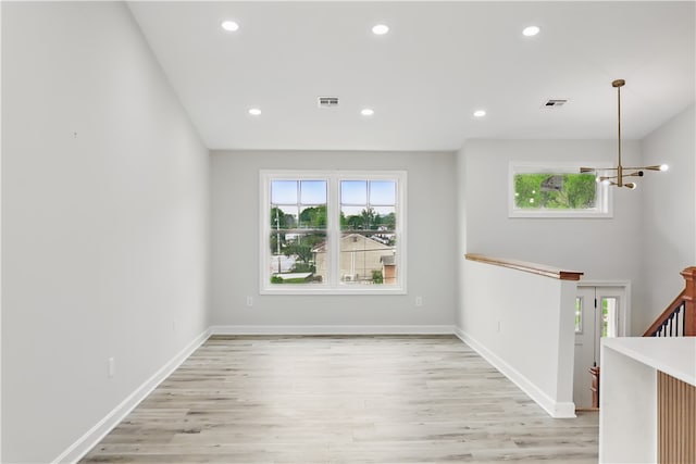 50 Rosemont Ave, Johnston, RI 02919 - unfurnished room featuring light wood-style floors, recessed lighting, and a chandelier