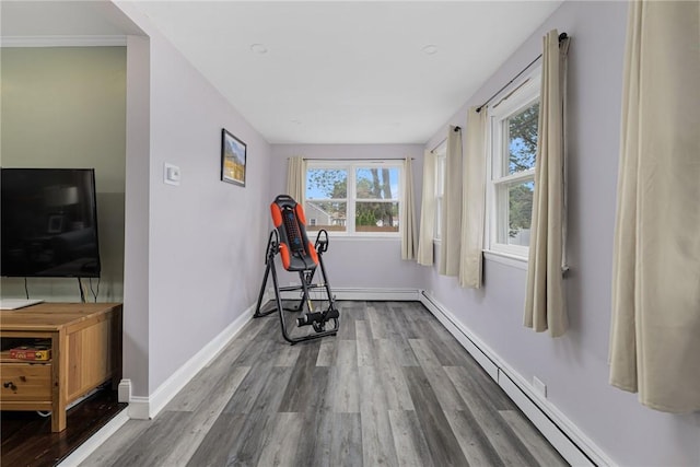 100 Pine Grove St, East Providence, RI 02916 - exercise room with wood finished floors and a baseboard heating unit