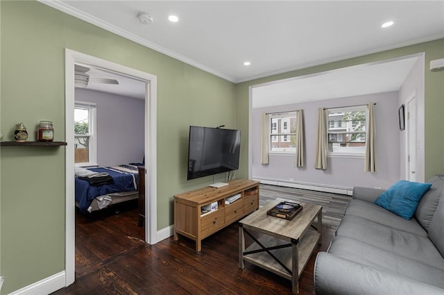 100 Pine Grove St, East Providence, RI 02916 - living area featuring a baseboard heating unit, hardwood / wood-style flooring, ornamental molding, and recessed lighting