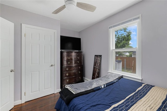 100 Pine Grove St, East Providence, RI 02916 - bedroom featuring wood finished floors, a ceiling fan, and baseboard heating