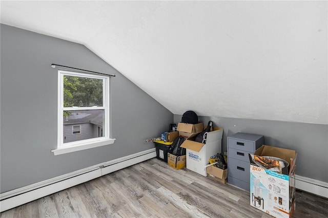 100 Pine Grove St, East Providence, RI 02916 - bonus room with a baseboard heating unit, wood finished floors, and vaulted ceiling