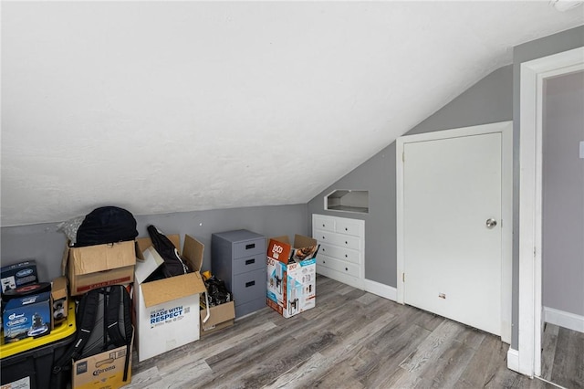 100 Pine Grove St, East Providence, RI 02916 - bonus room featuring wood finished floors and vaulted ceiling