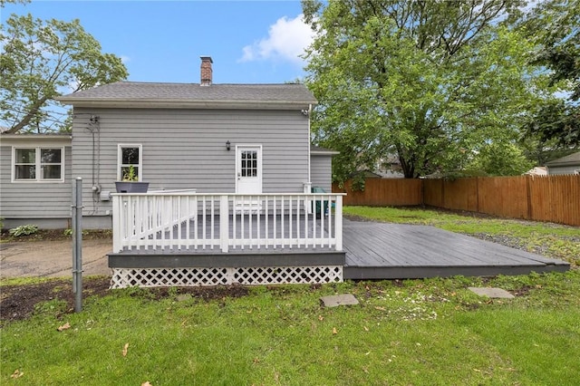 100 Pine Grove St, East Providence, RI 02916 - rear view of house featuring a fenced backyard, a chimney, and a wooden deck