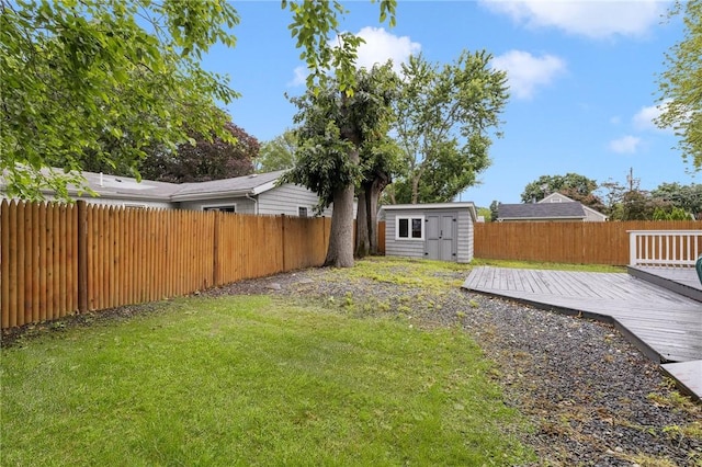 100 Pine Grove St, East Providence, RI 02916 - fenced backyard featuring a deck and a storage unit