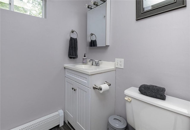 100 Pine Grove St, East Providence, RI 02916 - bathroom featuring baseboard heating and vanity