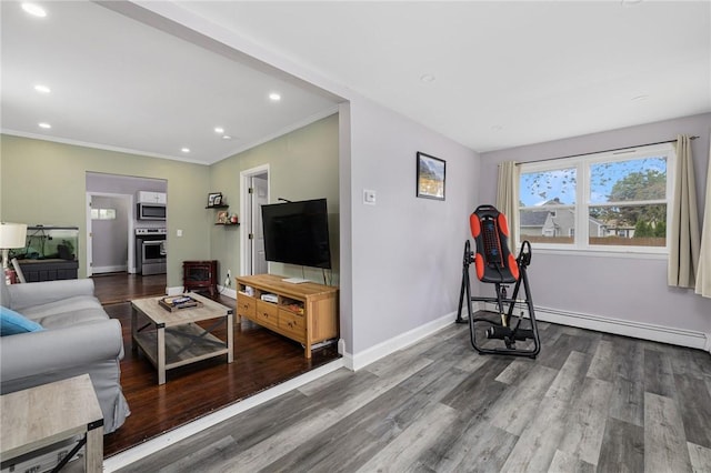 100 Pine Grove St, East Providence, RI 02916 - living area featuring wood finished floors, recessed lighting, a baseboard heating unit, and ornamental molding