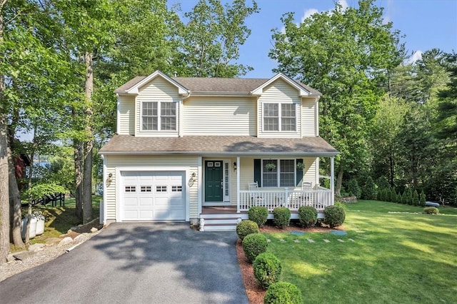 21 Laurel Dr, Glocester, RI 02814 - traditional-style home featuring covered porch, a front yard, driveway, an attached garage, and a shingled roof