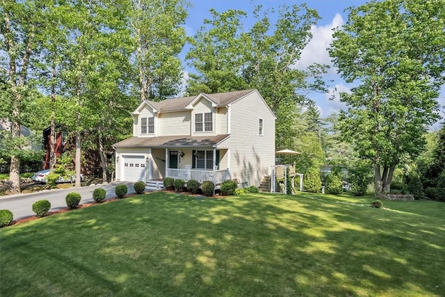 21 Laurel Dr, Glocester, RI 02814 - traditional-style house with a porch, a front lawn, driveway, a garage, and view of scattered trees