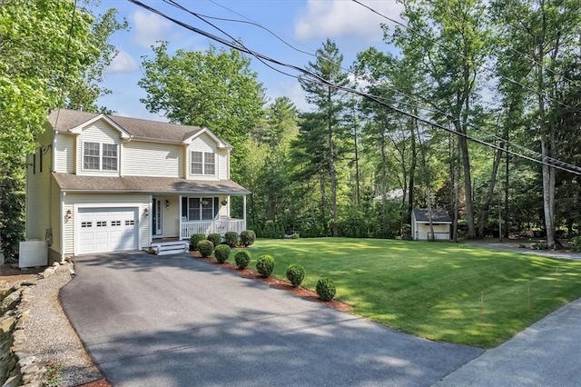 21 Laurel Dr, Glocester, RI 02814 - view of front of home featuring a porch, asphalt driveway, an attached garage, and a front yard