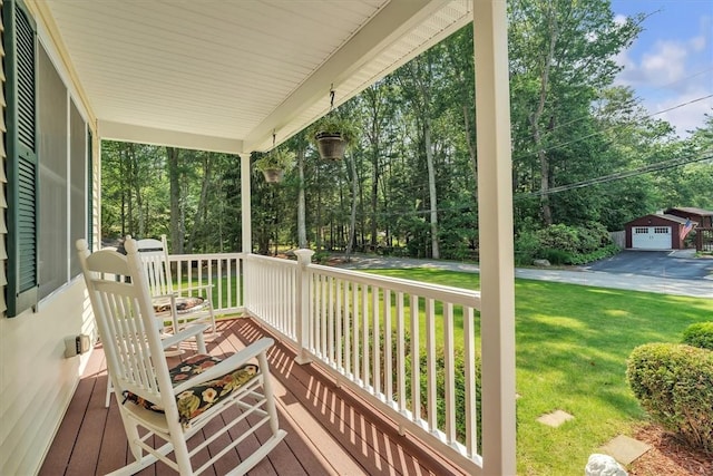 21 Laurel Dr, Glocester, RI 02814 - wooden porch with a lawn and view of wooded area