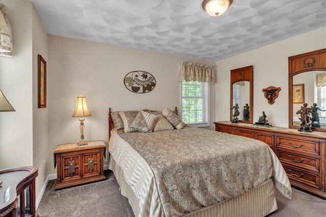 21 Laurel Dr, Glocester, RI 02814 - bedroom featuring dark colored carpet and baseboards