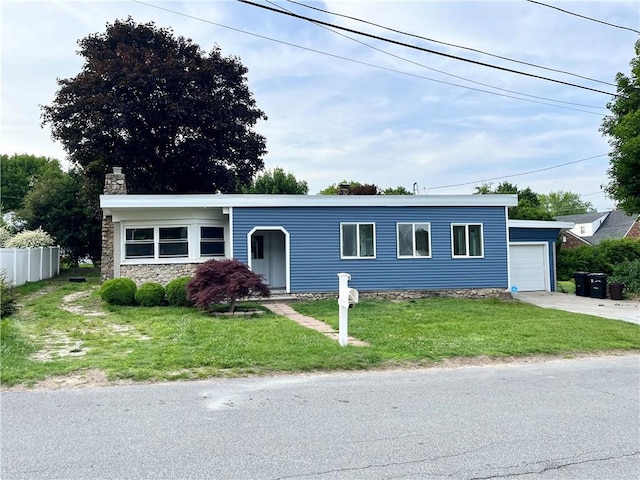 5 Gano Ave, Johnston, RI 02919 - view of front facade featuring an attached garage, a chimney, and concrete driveway