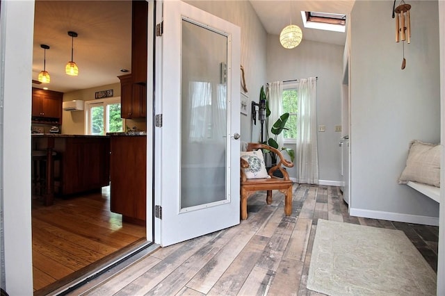 10 N Dr, Westerly, RI 02891 - entryway with an AC wall unit and wood finished floors
