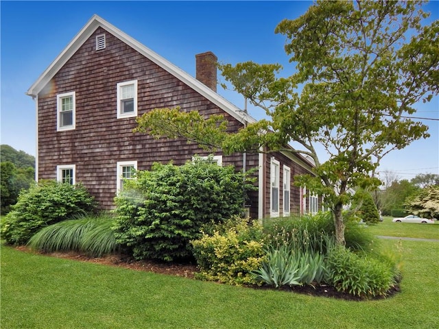 10 N Dr, Westerly, RI 02891 - view of side of property featuring a chimney and a yard
