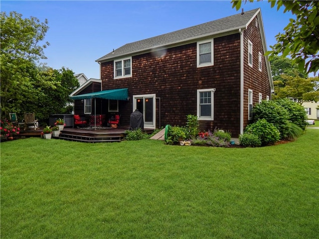 10 N Dr, Westerly, RI 02891 - back of house with a wooden deck, a yard, and roof with shingles