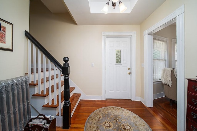 40 Vine St, East Greenwich, RI 02818 - entryway featuring wood finished floors, stairs, and a skylight
