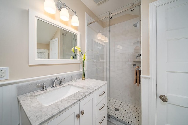40 Vine St, East Greenwich, RI 02818 - full bath with a stall shower, vanity, and wainscoting