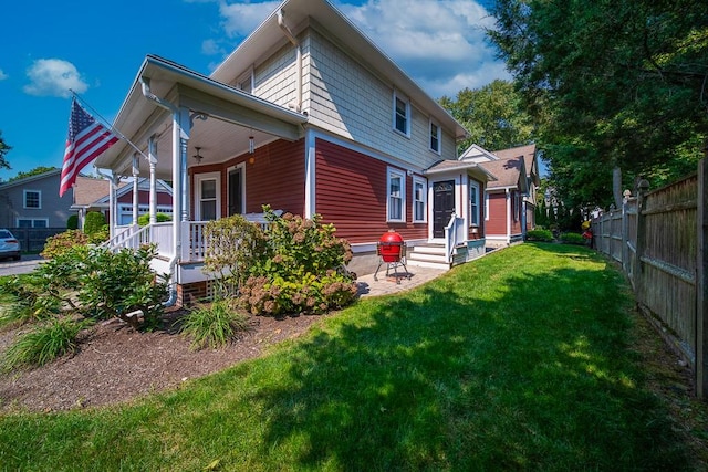 40 Vine St, East Greenwich, RI 02818 - back of house with ceiling fan and a porch