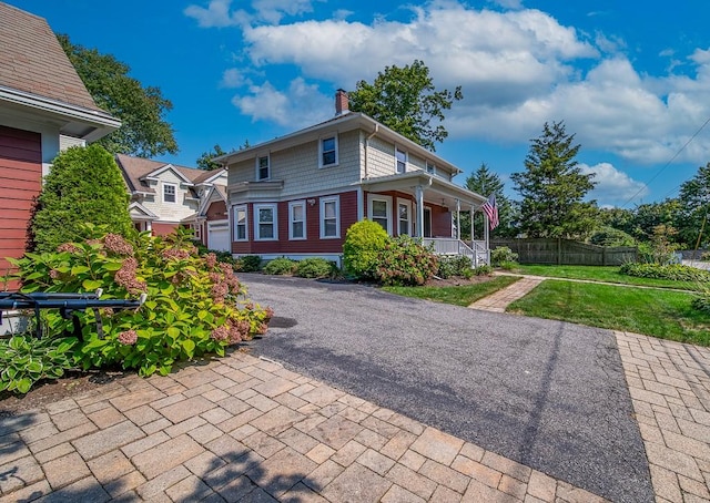 40 Vine St, East Greenwich, RI 02818 - view of front of property featuring a porch and a chimney